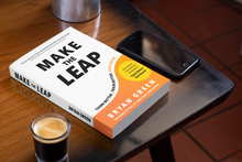 Load image into Gallery viewer, Digital rendering of physical book on table next to phone and espresso